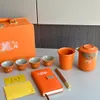 Designer Orange Tea Set Classic Letter Logo Tea Making Set Travel Convenient Gift Tea Set including Notebook with Portable suitcase