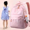 Sacos escolares mochila para estudantes primários homens e mulheres tendência estrela luz saco grande capacidade impermeável mochila de nylon