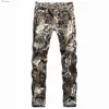 Pantalones vaqueros para hombre Pantalones vaqueros de calle de color piel de serpiente para hombre de alta calidad Pantalones de club nocturno de estilo fresco y ajustados Pantalones vaqueros elásticos de hip-hop; L240119