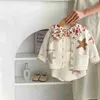 Ensembles de vêtements 2024 Spring New Baby Girl Star Pattern Set Tricoted Set Infant Sans manche BodySuit de poche + Cardigan Coat 2pcs Suit Toddler Outfits H240508