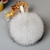 Nyckelringar stora 10 cm fluffiga riktiga päls boll pom poms naturliga pompom läder rem nyckelring nyckelkedja ring hänge för kvinnor charm