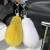Porte-clés en peluche véritable fourrure porte-clés pour femmes sac pendentif mignon petite queue ornements voiture porte-clés bibelot jouet accessoires de mode cadeau