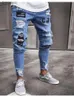 Jeans da uomo Jeans ricamati bianchi Jeans skinny strappati elasticizzati in cotone Pantaloni hip-hop oversize slim fit con buco nero di alta qualitàL240119