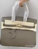 Uma bolsa clássica de Birknns de ponta de alta e mais sofisticada 2024 Couro de bezerro de Togo com crocodilo camada de cabeça genuína feminina de trava de mão LSBI