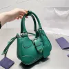 Triângulo de alta qualidade feminino Bolsa de lua de lua bolsa de luxo bolsas de couro rosa bolsas de embreagem carteira masculino bola crossbody designer bolsa