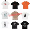 MenswomensデザイナーグラフィティTシャツプリントファッションマンTシャツコットンカジュアルティーショートスリーブラグジュアリーヒップホップストリートウェアアミールネスメンズシャツホワイトオレンジE2