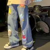 Jeans masculinos homens e mulheres em linha reta solto outono estilo coreano desenhos animados impressos calças jeans rua hip-hop bonito calças de nove pontos fashionl240119