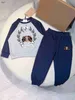 Brand Baby TrackSuits Autumn Dwupoziomowy zestaw Rozmiar 90-160 Designer Designer Ubrania Logo Wydrukowane patchwork Bluzy i spodnie Jan1