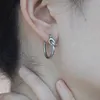 Luxe oorbellen dames ontwerper 18K verguld met origineel label CELL knopen draaiende hoepel