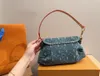 Top Designer Denim Engot Underarm Femme's Tote Makeup Sac à bandoulière Premium Vintage Chic Casual 27cm