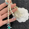 Designer French Luxury 2024 New Pearl Necklace Classic Double Letter Tassel Emerald Five pointed Star Women Charm Jewelry Girl Fashion Sweet Gift