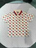 Classics Kids Polo Shirt Letter broderad logotyp Baby Lapel Tees Storlek 100-150 Summer Short Sleeve Boy Girl T-shirt Jan20