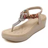Sandaler 2024 Summer Ethnic Women's Shoes Beach Seaside Wedge Heel Stängd tå för kvinnor klädt mode