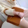 En Birknns designer Bag kapacitet Guld Stor inslagna nya Crossbody Handbag Top Layer of Trendy Cowhide Buckle Single Shoulder äkta läder Kvinnor 5014 P5E7 P5E7