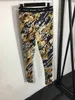 Zweiteiliger Damen-Designer-Anzug, Retro-Muster, mit Buchstaben bedruckt, Langarm-Top + modische, elastische, schlanke Leggings, 20. Januar