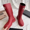 Kvinnor Rainboots Designer Slip On Leisure Shoe Rubber Sole Retro Black Red Brown Snow Boot 24SS Winter Boot With Duat Påsar Klassisk utomhusvattentät avslappnad sko