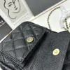 Mini zaino di marca di design di lusso litchi grano pelle di vacchetta piccolo zainetto borsa a tracolla a catena di moda da donna zaino all'ingrosso