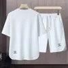 Suissiles de survêtement masculins Setwear masculin Rétro Short T-shirt en vrac avec crampon de taille en soie en soie en tissu de couleur solide