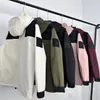 Jaqueta de moda feminina do norte de inverno Cotton Men Puffer Parkas com letras Bordado de jaquetas ao ar livre Face Coat Streetwear Roupos Quente 2024