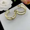 Boucles d'oreilles de bijoux de marque de luxe Lumières en forme de feu d'oreilles en forme de V française lettre à double couche personnalisée plaqué avec k golds-oreilles polyvalentes