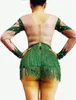 ステージウェアヌード長袖輝くグリーンラインストーンタッセル女性用ナイトクラブDJ衣料品歌手衣装のためのセクシーなボディースーツ