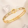 Nya armband Kvinnor Bangle Luxury Hollowing Out Designer 18K Gold Plated rostfritt stål rosguldälskare armband Mensarmband ZG2426