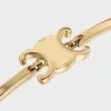 Designer Gold Metal Armband Kvinnor Rostfritt stål Armband Charms smycken Klassiska mönster Casual Party Holiday Gifts