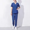 Pantaloni a due pezzi da donna Abiti Scrub moda Scrub Set per donna Pantaloni da jogging Top Uniforme infermieristica con scollo a V Tinta unita Abbigliamento da lavoro