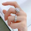 Choucong Bagues de mariage étincelantes Bijoux fins de luxe 100% solide en argent sterling 925 Forme de coussin Blanc Moissanite Diamant Pierres précieuses Fête Femmes Couple Bague de mariée