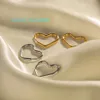 Pendientes de aro delicados con diseño de corazón simple de acero inoxidable chapado en oro de 18 quilates, joyería de moda que no se deslustra para mujer