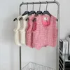 Damenwesten Quasten Weste für Frauen Junge rosa weiß solide kurze Mantel Knopf elegante Oberbekleidung hohe Qualität
