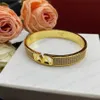 Bracciale rigido classico di design, elegante, da donna, lucido, design semplice con lettere, 2 colori oro argento