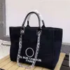 Designer Luxo Bolsas femininas Bolsas de noite Brand Chand Tela Bordado Bolsa de praia Moda de alta qualidade Classic Grande mochila fêmea pequena mini bolsa