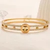 Nya armband Kvinnor Bangle Luxury Hollowing Out Designer 18K Gold Plated rostfritt stål rosguldälskare armband Mensarmband ZG2426