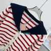 2024SS Kvinnors tröja Röd stickad Pullover Spring Long Sleeved O-Neck Casual Navy Style Contrast Striped Sweater Women's Doll Neck Sweet Sweater