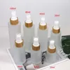 Bottiglie di stoccaggio Imballaggio in bambù Cosmetico satinato 20ml 30ml 50ml Barattoli di vetro e con coperchio per contagocce Spray Tappo in legno 80ml 60ml