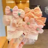 Elastici per bambini Corde per bambini Fiocchi per fiori in tessuto per ragazze Accessori non dannosi Passanti per capelli carini Coda di cavallo Usura della testa