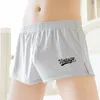 Underpants Men Hollow Out Soft Breathable Solid Color 3D Cutting Ice Silk Mid Waist Elastic Quick Dry Boxers Underwear