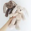 31 cm moelleux lapin en peluche jouets dessin animé animal en peluche poupée peluche avec nœud papillon pour enfant Kawaii poupées anniversaire cadeau de Noël 240118