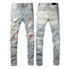 Designer Mens Jeans Pants for Men Ripped broderi Pentagram lapptäcke för trendmärke Motorcykelbyxa Skinny herrkläder