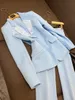 2024 Lente Hemelsblauwe Effen Kleur Tweedelige Broeksets Lange Mouw Notched Revers Single-Button Blazers Top + Flare Broek Broekset Tweedelige Pakken O4J152225