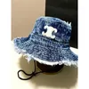 Chapeau de seau de luxe Chapeaux à larges bords Chapeau de seau de créateur Chapeau de plage Casquette de protection solaire Hommes Femmes Toile Denim Bassin Chapeaux Chapeau de soleil d'été avec mentonnière réglable