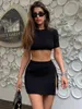 Spódnice 2-częściowe zestawy stałe dzianiny kobiety o szyjce z krótkim rękawem guziki dzielone bodycon mini swobodny zestaw streetwear