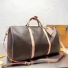 Designer quente dufflemen mulheres moda bolsa de viagem grande capacidade bolsa clássico impresso revestido lona couro bolsa de viagem bolsa de embarque