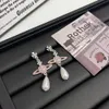 Viviennes Westwoods Pearl örhängen Pearl Long Tassel örhängen unika design kreativa örhängen trendig