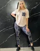 Summer Nfew Women's Brand New Tracksuits Designer 2 Piece Set Letter Print G Kort ärm T-shirt+Pant Sexig Back Lace Beigt Tshirt Legging Pants