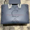 高級バッグデザイナートートリベット本革のブランドボトムコンポジットハンドバッグ