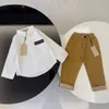 Ensembles de vêtements pour bébés enfants t-shirt pantalons costumes à carreaux fille garçon enfant marque chemises de créateurs pantalons vêtements pour enfants uniforme de jeunesse de luxe à manches longues lettres T-shirts pantalons