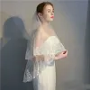 Bröllopslöja armbågslängd två lager spetsblommor applikation sequined vit elfenben utsökt brudslöjor med kam