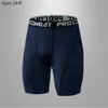 Pantalons compression shorts hommes coulant de la musculation de bodybuildage